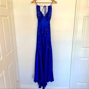 Niki Lavis blue open back sequined gown